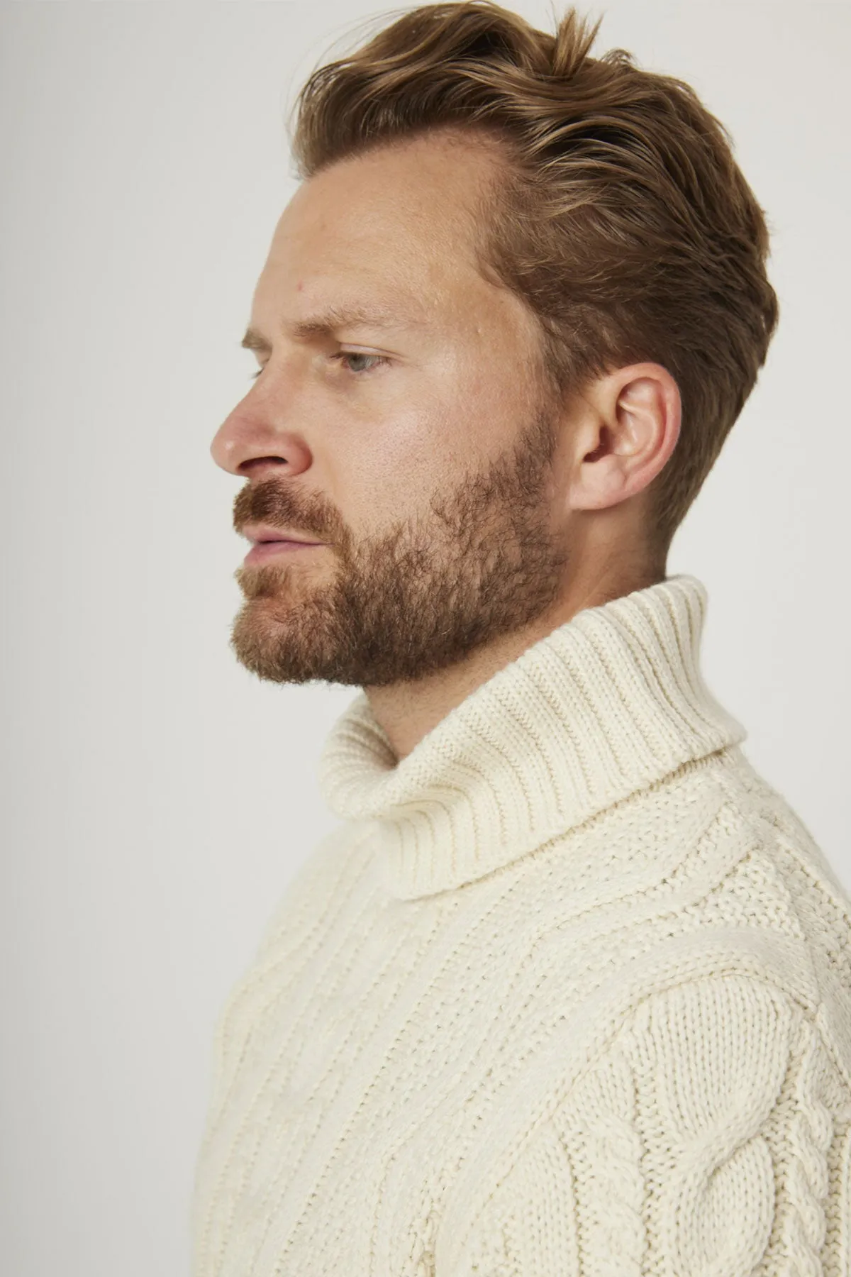 Peregrine - Fisherman Roll Neck Jumper in Ecru